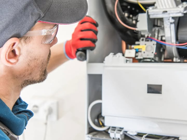 Lopez Plumbing technician working on bathroom plumbing repair